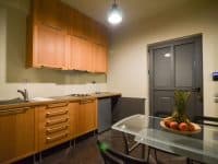 Villa-Copper-Evia-by-Olive-Villa-Rentals-seperate-space-kitchen