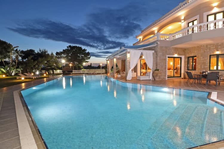 Villa Rafaella's exterior and its pool. 