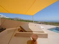Villa-Nefeli-Santorini-by-Olive-Villa-Rentals-pool-sunbed