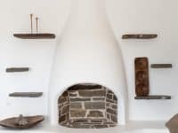 Villa- Coco White -Paros-by-Olive-Villa-Rentals-living-room-fireplace