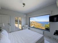 Villa-Delos Mare-Mykonos-by-Olive-Villa-Rentals-bedroom-upper-floor