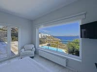Villa-Delos Mare-Mykonos-by-Olive-Villa-Rentals-bedroom-upper-floor
