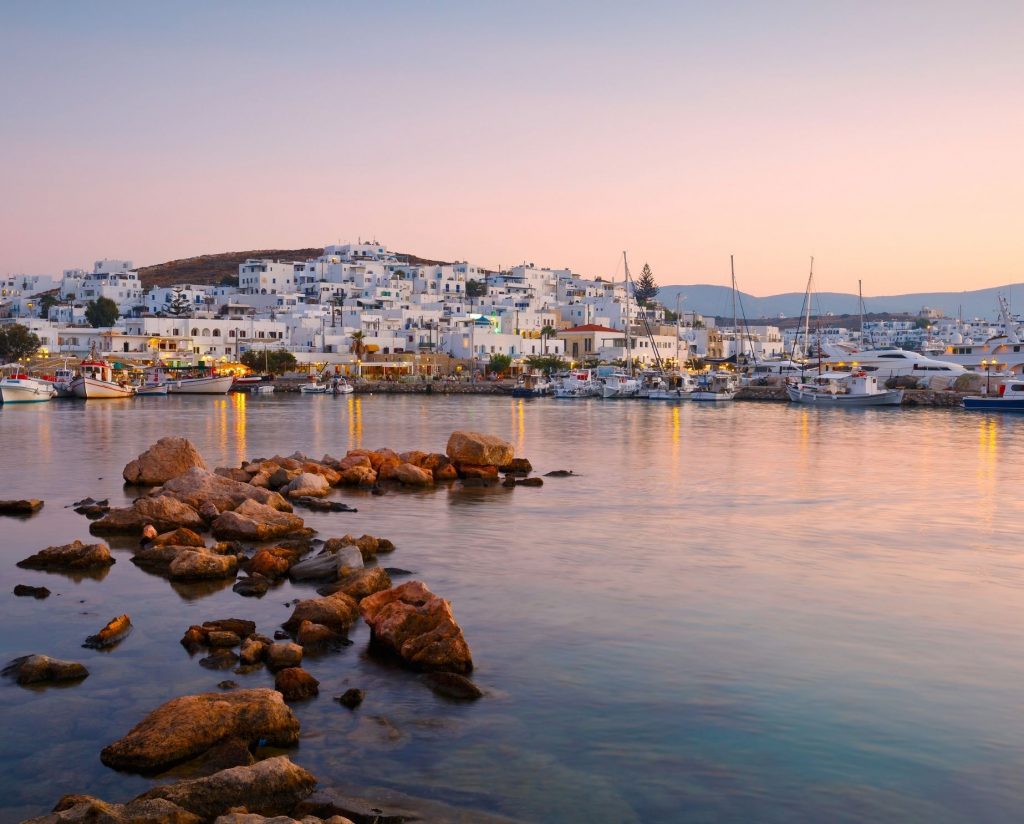 the port of Paros island during sunset. Plan your trip