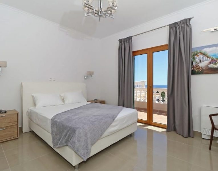 Villa-Rafaella-Porto Heli-by-Olive-Villa-Rentals-bedroom-upper-floor