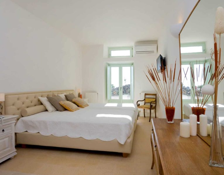 Villa Roccia Nera in Santorini Greece, bedroom, by Olive Villa Rentals