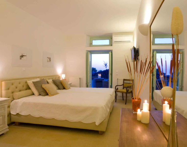 Villa Roccia Nera in Santorini Greece, bedroom, by Olive Villa Rentals