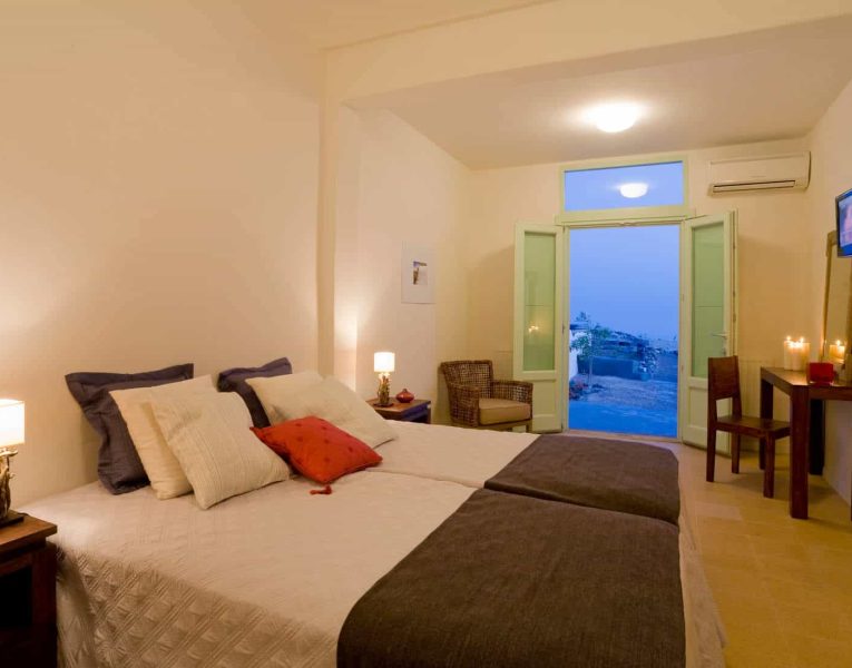 Villa Roccia Nera in Santorini Greece, bedroom, by Olive Villa Rentals