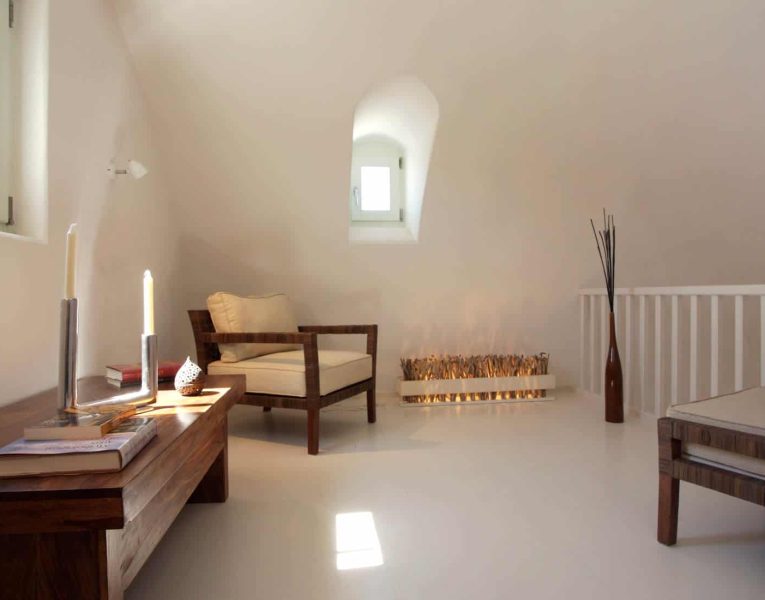 Villa Roccia Nera in Santorini Greece, living room, by Olive Villa Rentals