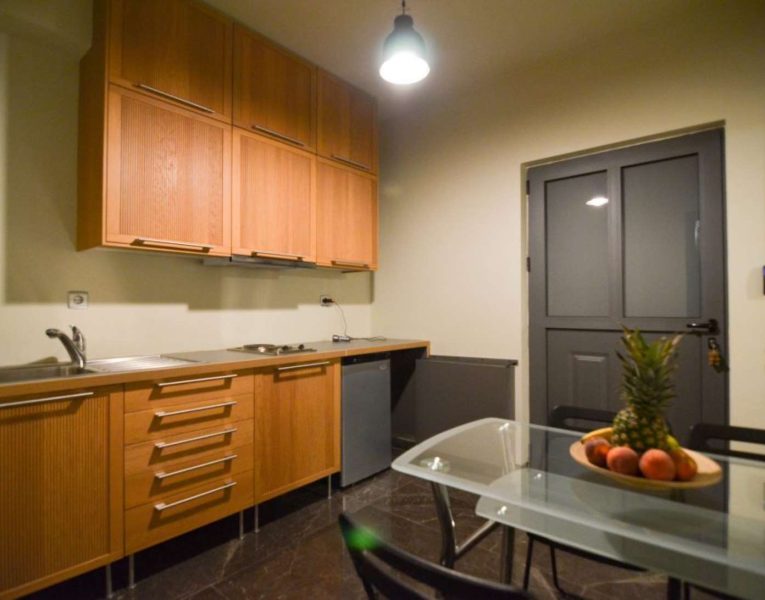 Villa-Copper-Evia-by-Olive-Villa-Rentals-seperate-space-kitchen
