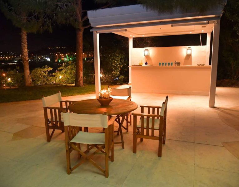 Villa- Lenora -Athens-by-Olive-Villa-Rentals-exterior-seating-area-night