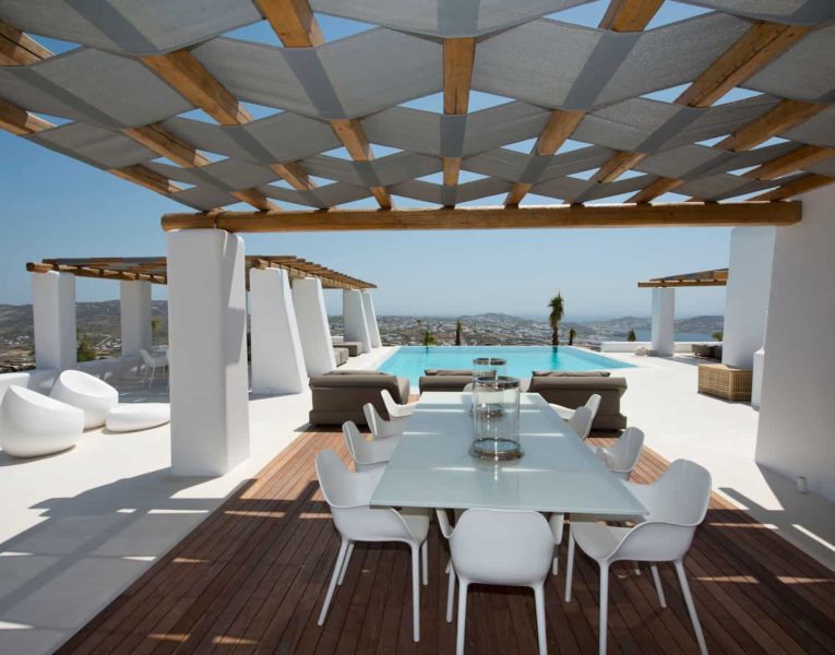 Villa- Martini-Mykonos-by-Olive-Villa-Rentals-exterior-pool-area-dining-room