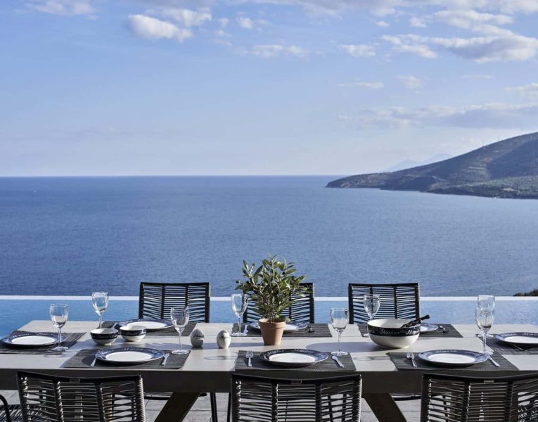 Villa- Clytia -Nauplion-by-Olive-Villa-Rentals-pool-area-dining-space