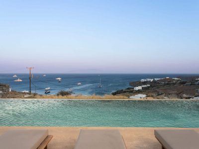Villa-Etoile-Mykonos-by-Olive-Villa-Rentals-exterior-pool-area-evening