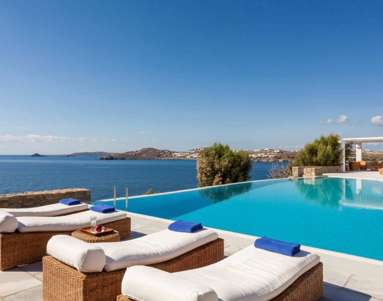 Villa- Octavia -Mykonos-by-Olive-Villa-Rentals-pool-area-sunbeds