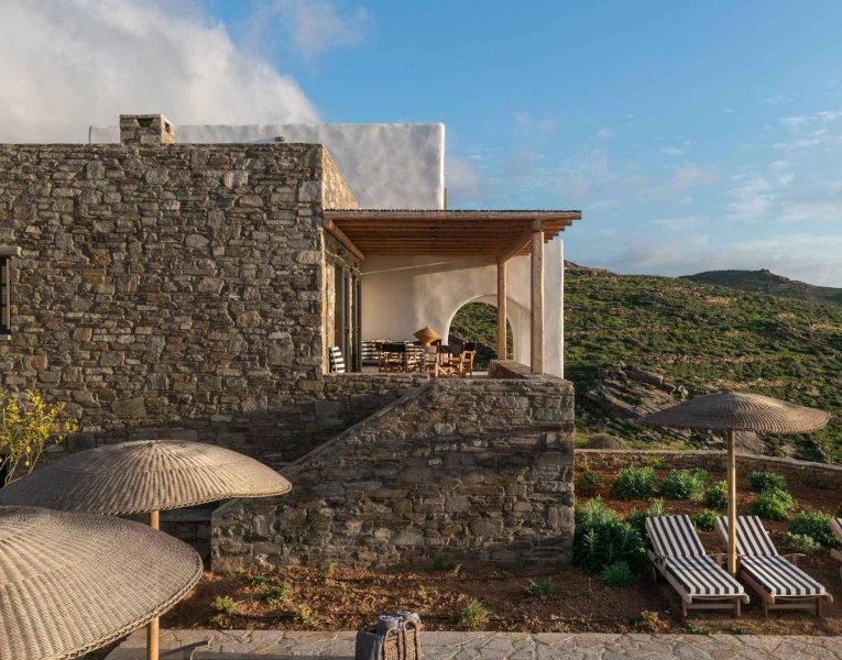 Villa- Cinqo-Paros-by-Olive-Villa-Rentals-exterior-pool-area-sunbeds