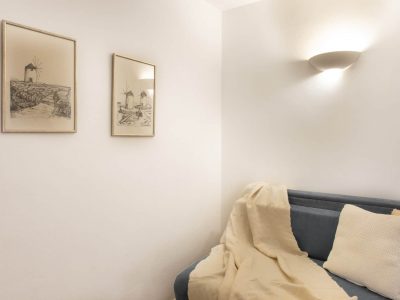Villa- Coco White -Paros-by-Olive-Villa-Rentals-lower-floor-bedroom-sofa-bed