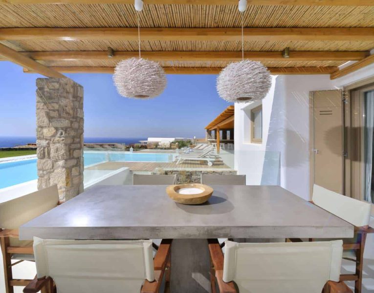 Villa Hypatia in Mykonos Greece, dining table, by Olive Villa Rentals